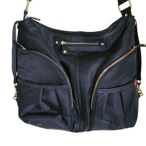 skip hop versa expandable diaper bag with adjustable shoulder strap black